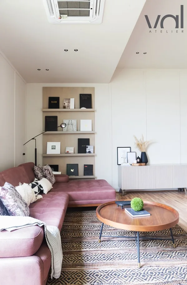 The studio lounge, with the shelves of books behind